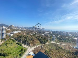 IDEAL INVESTMENT IN RENOWNED LUXURY COMPLEX - MODERN SEA VIEW APARTMENT IN MAHMUTLAR/ALANYA